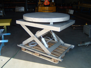 Stainless steel lifting platform with turn table